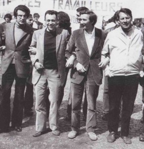 Manifestation du 1er mai 1971, Paris. De gauche à droite : Alain Krivine, Michel Rocard, Gilbert Marquis, Michel Fiant.